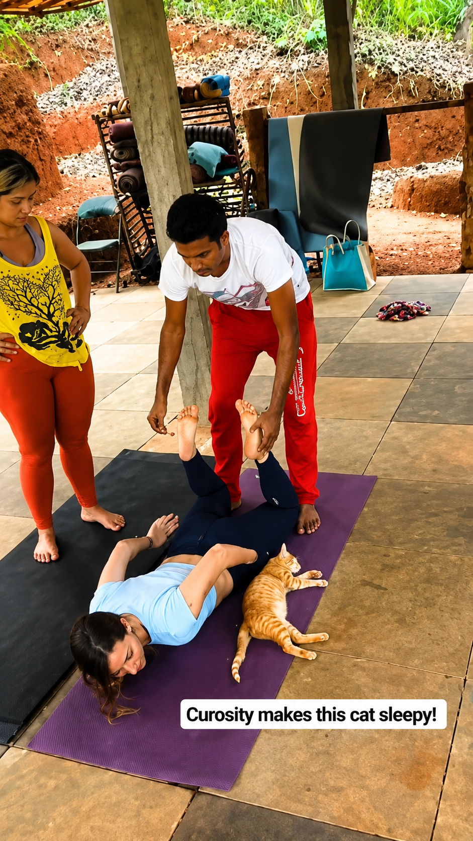 Group of trainees seated together indoors on mats