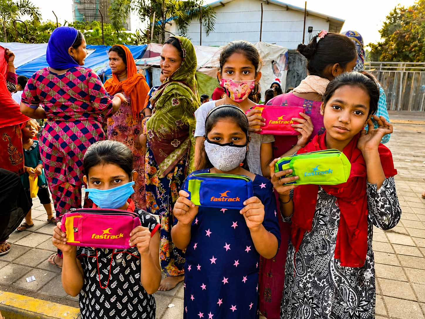 Group of children and volunteers wearing masks at a gathering