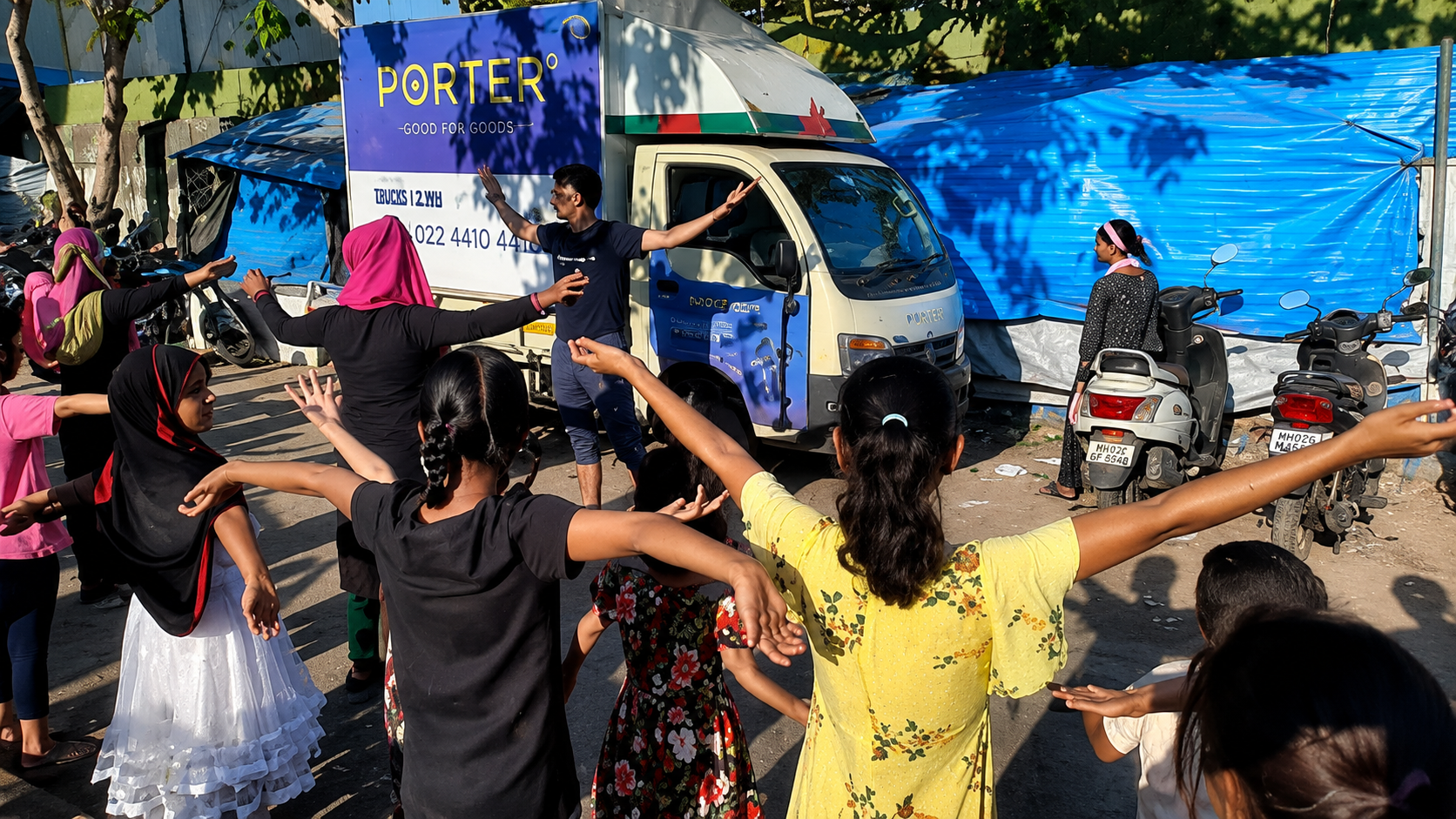 Volunteer dancing joyfully during a street event
