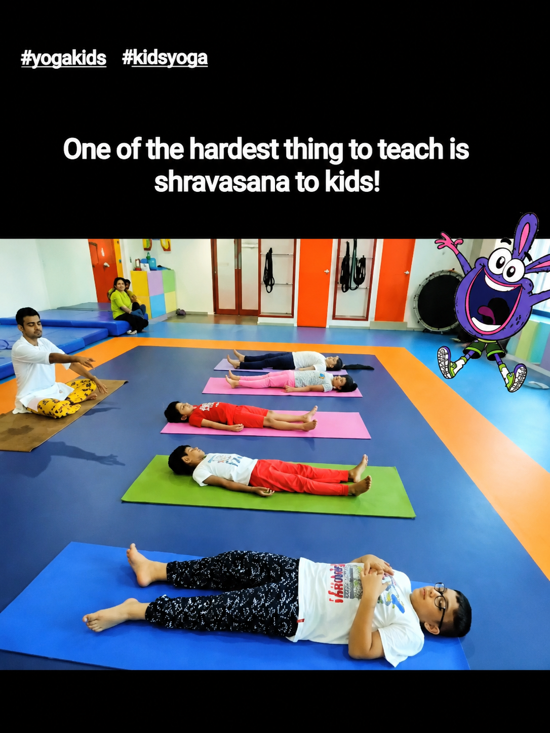 Child practicing a shoulder stand pose indoors