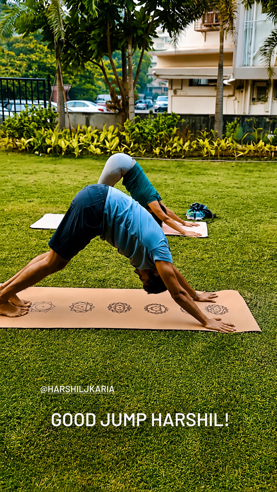 Student practicing a lunge pose outdoors in the park