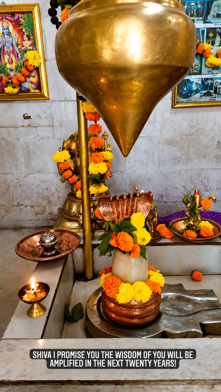 Decorated puja lamp on an ashram altar